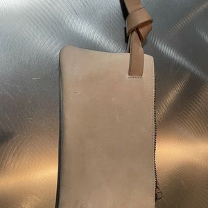 ABLE leather hand clutch